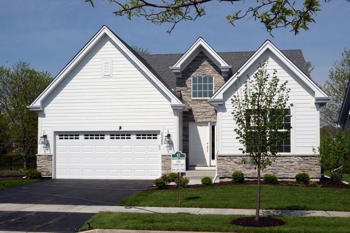 Open modern traditional ranch plan available in Fisher Farm of Winfield
