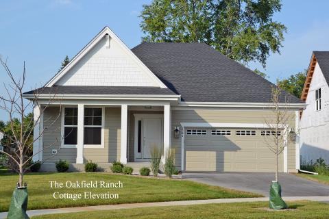 The Oakfield Ranch home with a cottage style porch elevation by homebuilder Airhart Construction