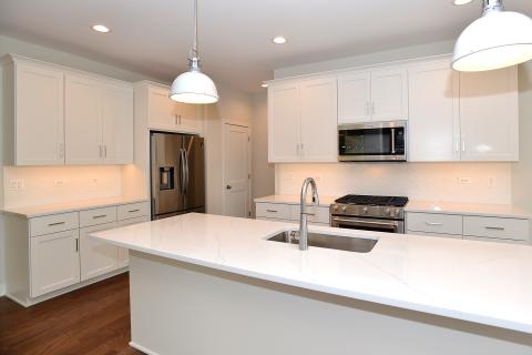 The Oakfield Ranch home kitchen for sale in Munhall Glen lot #50