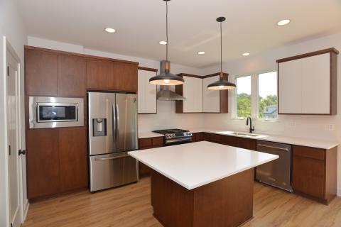McAlister - Yorktown cabinet door with painted uppers and walnut