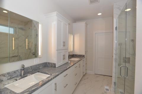 Harrison - owners suite bathroom with cabinet mounted on counter