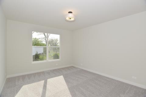 Oakfield Ranch home with Nantucket elevation and three car garage for sale in Saint Charles Illinois 