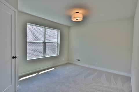 The Sandhill with screened porch and first floor master bedroom for sale in Saint Charles Illinois