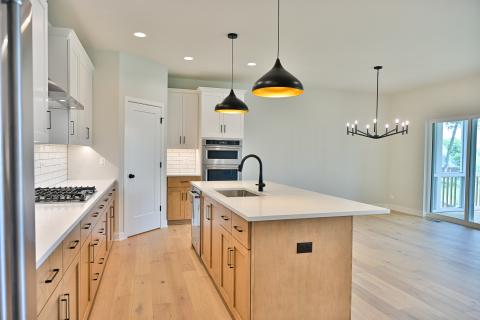 The Sandhill with screened porch and first floor master bedroom for sale in Saint Charles Illinois