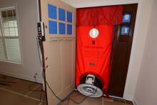 Blower door testing is used to determine home air infiltration